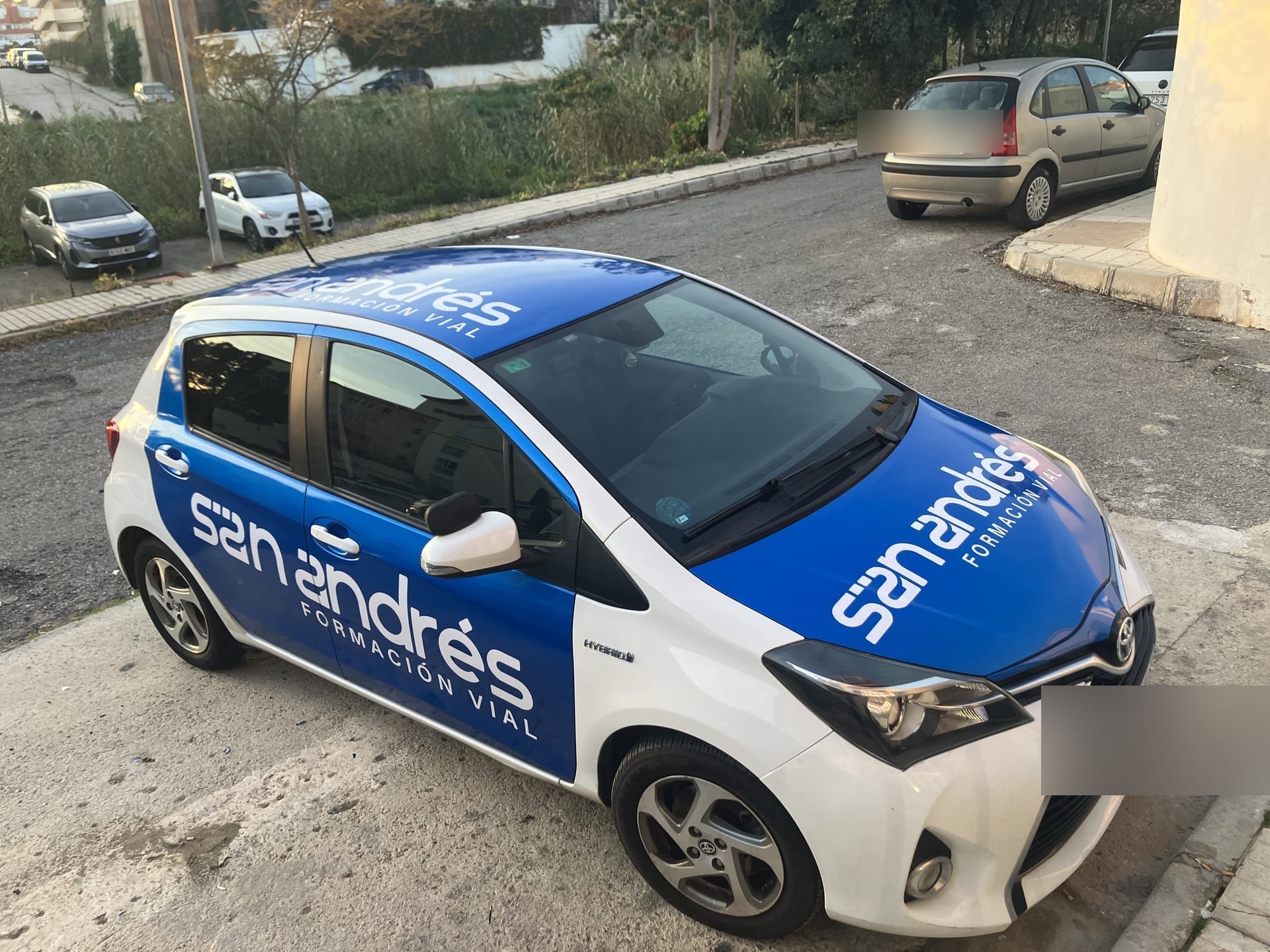 Turismos comerciales — Flota San Andrés, rotulación de flota en Málaga — Hangar Wraps (detalle 3)