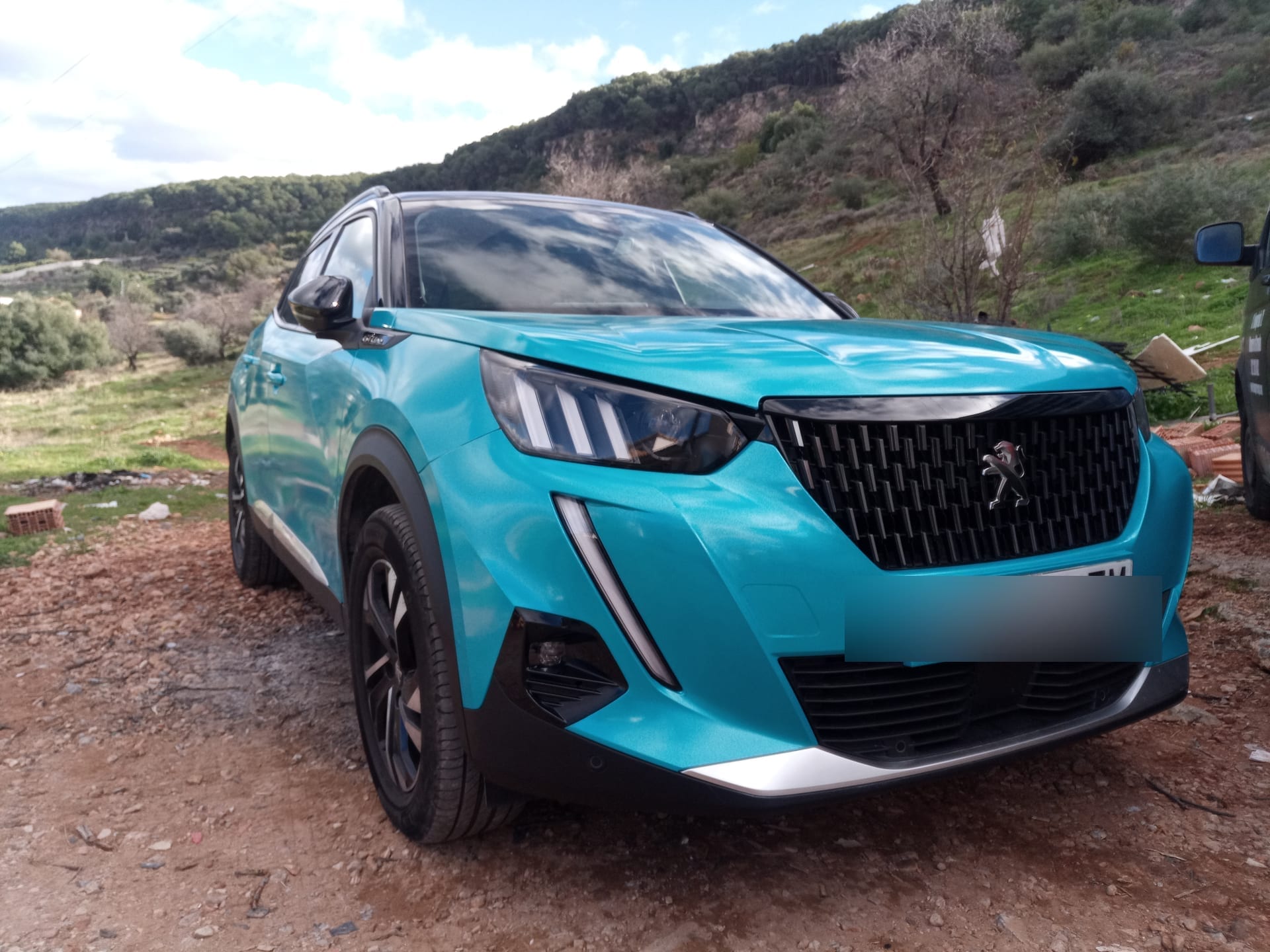 Peugeot — Peugeot Turquesa Glitter, vinilado de vehículo en Málaga — Hangar Wraps (detalle 2)